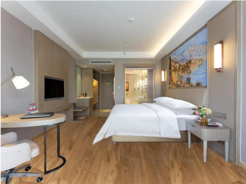 Bed in Vienna Hotel Jiangxi Fuzhou Yihuang