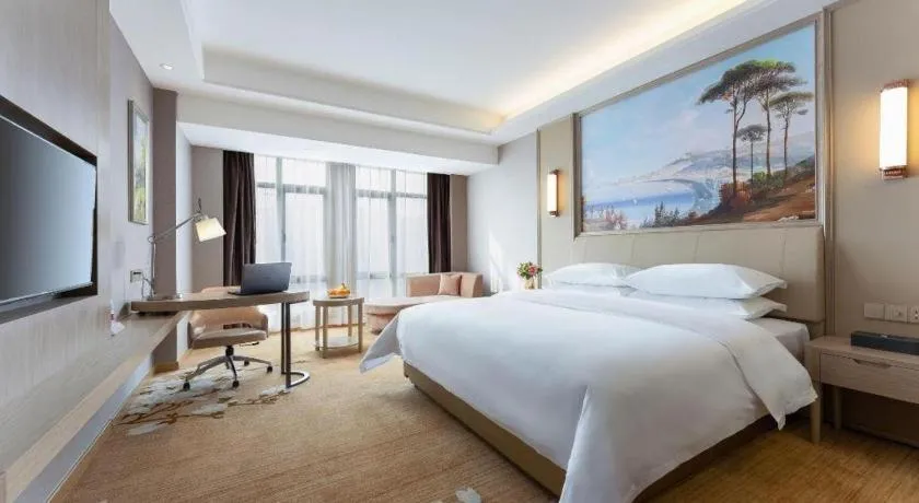 Bed in Vienna Hotel Jiangxi Fuzhou Yihuang