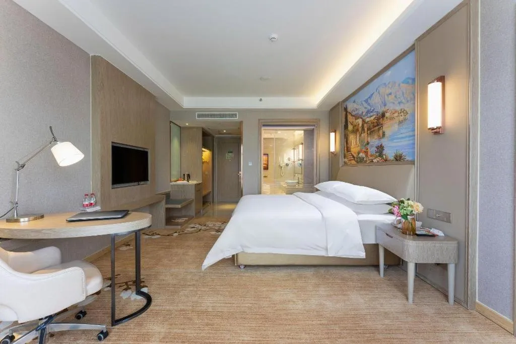 Bed in Vienna Hotel Jiangxi Fuzhou Yihuang