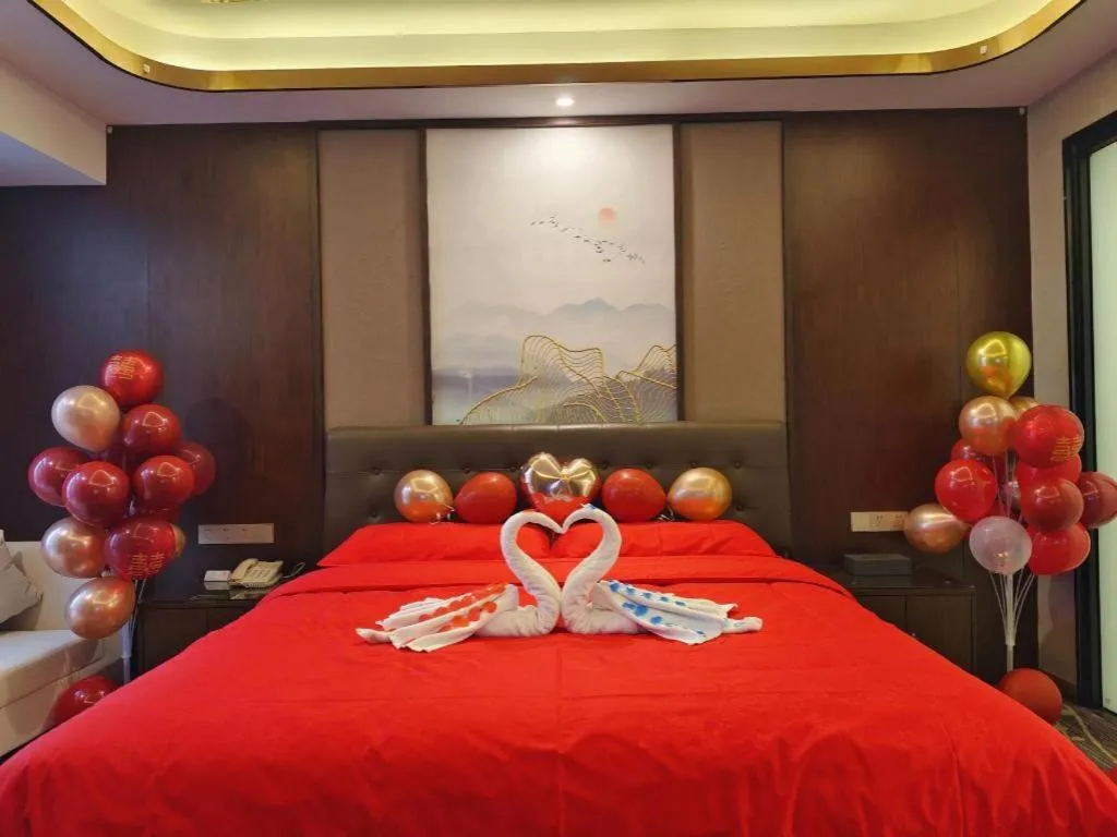 Bed in Vienna Hotel Jiangxi Fuzhou Yihuang