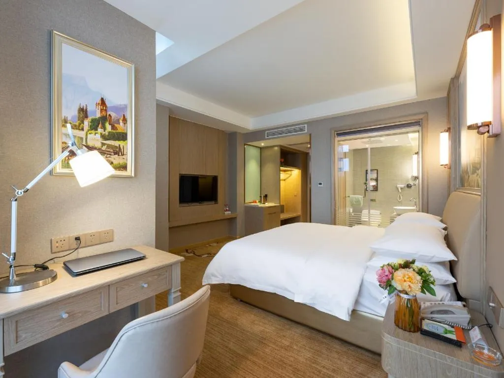 Bed in Vienna Hotel Jiangxi Fuzhou Yihuang