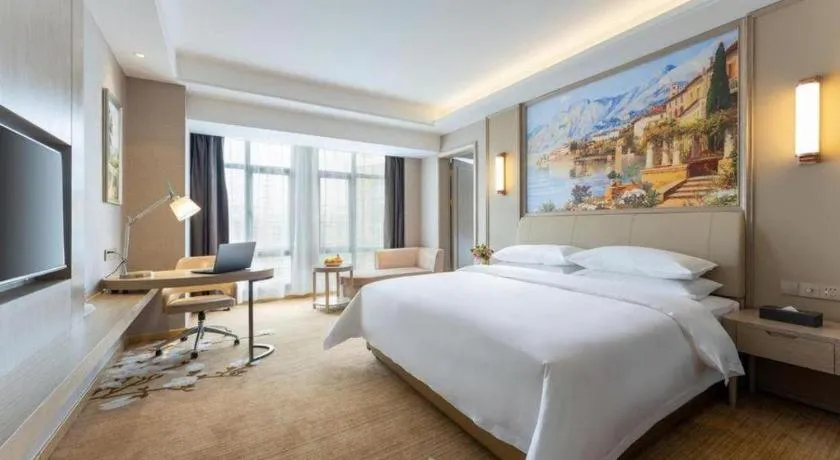 Bed in Vienna Hotel Jiangxi Fuzhou Yihuang