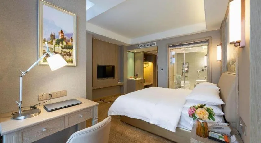 Bed in Vienna Hotel Jiangxi Fuzhou Yihuang
