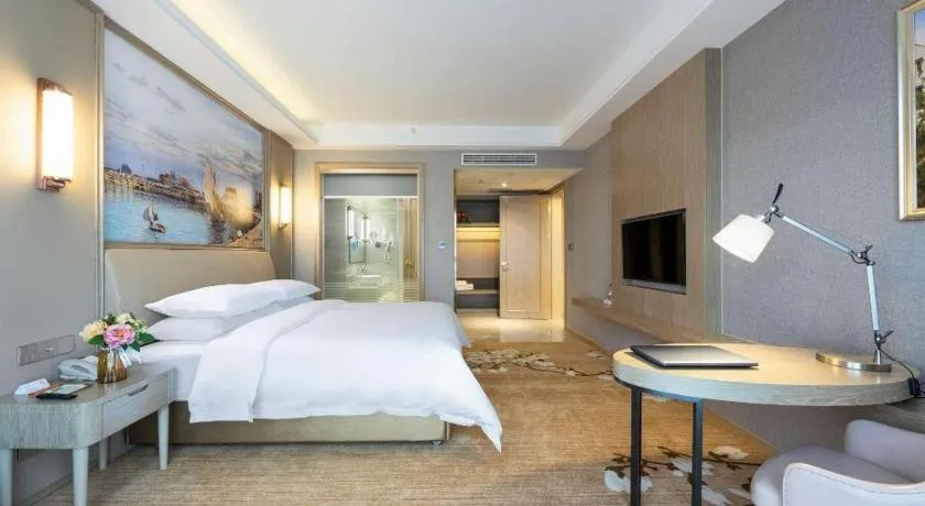 Bed in Vienna Hotel Jiangxi Fuzhou Yihuang