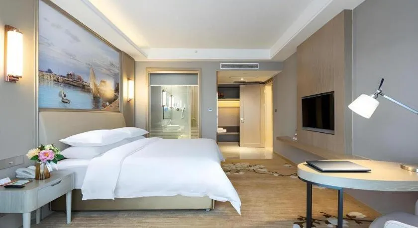 Bed in Vienna Hotel Jiangxi Fuzhou Yihuang