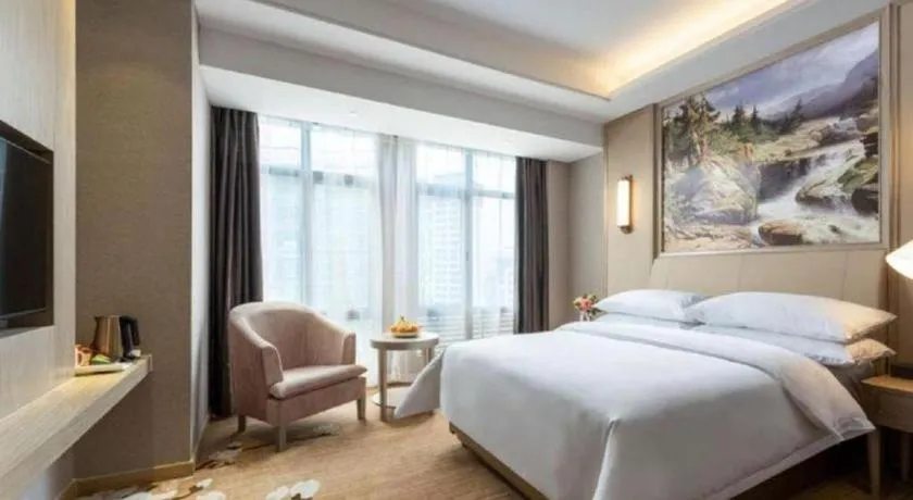 Bed in Vienna Hotel Jiangxi Fuzhou Yihuang