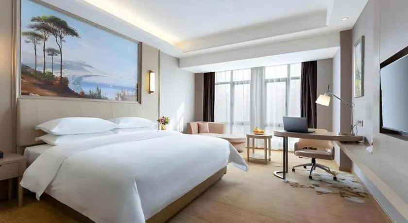 Bed in Vienna Hotel Jiangxi Fuzhou Yihuang