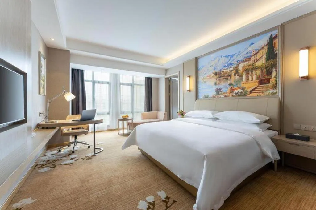 Bed in Vienna Hotel Jiangxi Fuzhou Yihuang