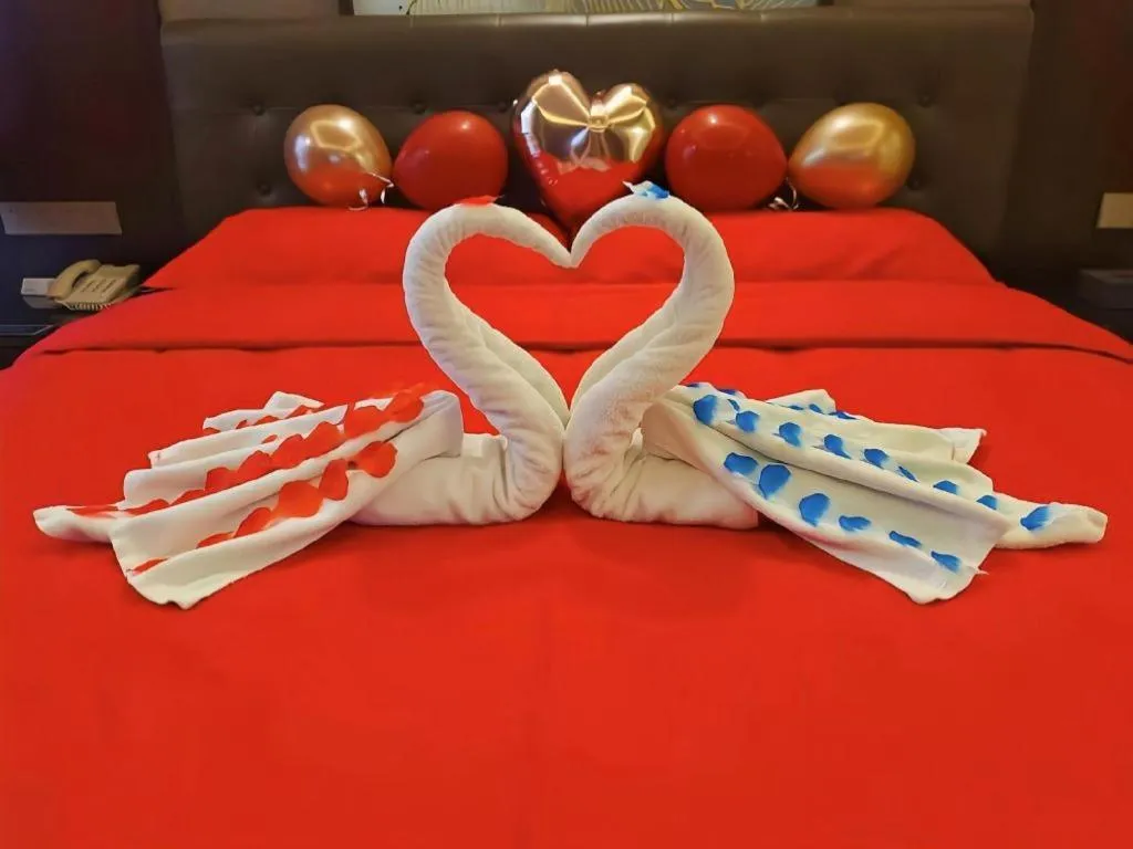 Bed in Vienna Hotel Jiangxi Fuzhou Yihuang