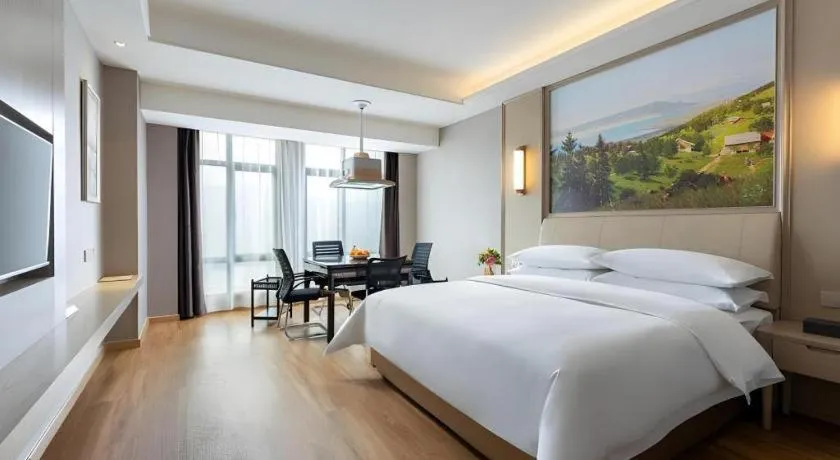 Bed in Vienna Hotel Jiangxi Fuzhou Yihuang