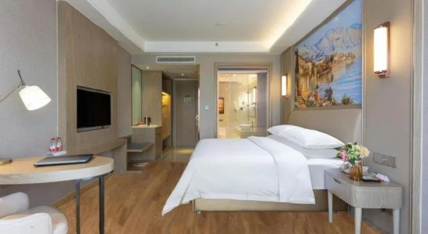 Bed in Vienna Hotel Jiangxi Fuzhou Yihuang