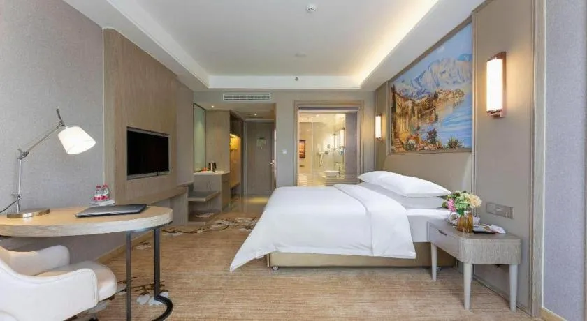 Bed in Vienna Hotel Jiangxi Fuzhou Yihuang