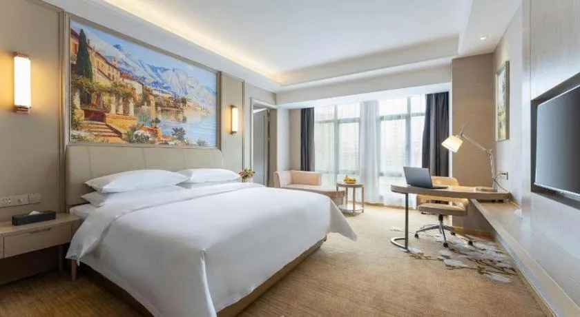 Bed in Vienna Hotel Jiangxi Fuzhou Yihuang