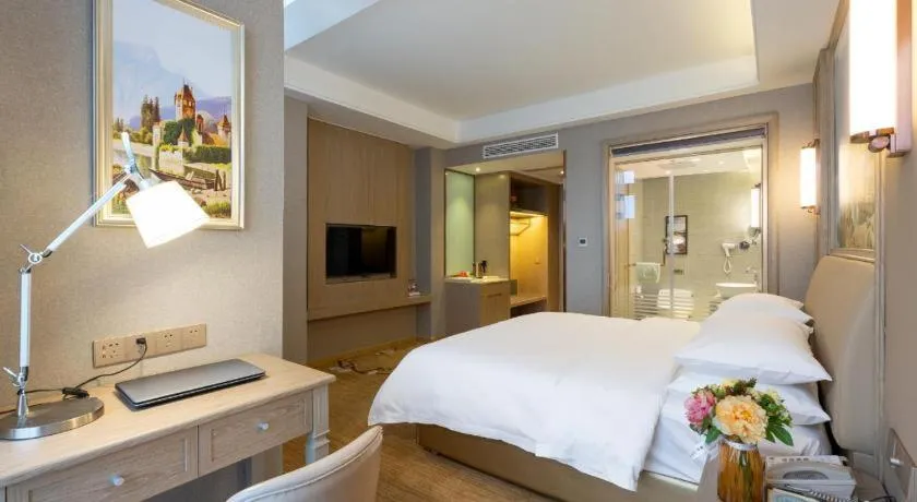 Bed in Vienna Hotel Jiangxi Fuzhou Yihuang