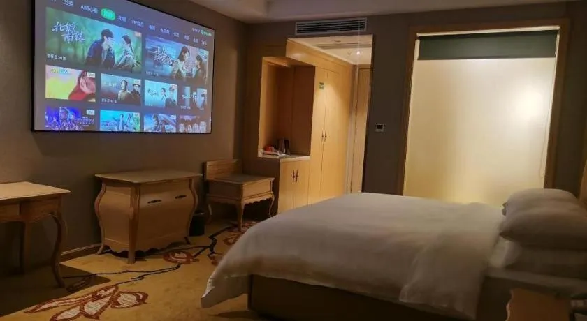 Bed in Vienna Hotel Jiangxi Fuzhou Yihuang