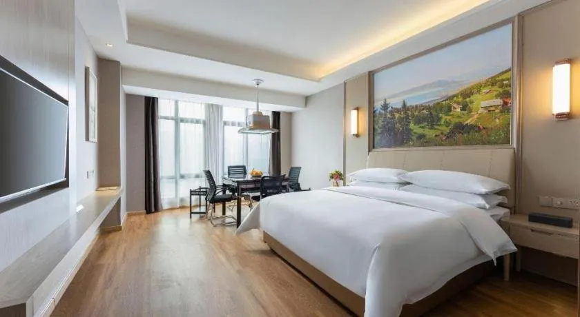 Bed in Vienna Hotel Jiangxi Fuzhou Yihuang