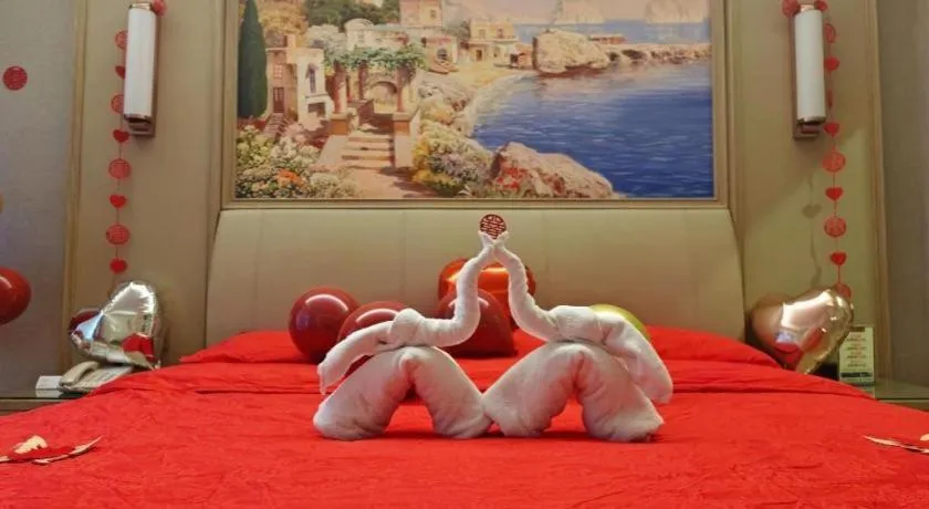 Bed in Vienna Hotel Jiangxi Fuzhou Yihuang