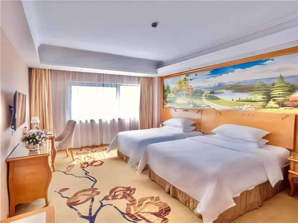Bed in Vienna Hotel Suzhou Yangcheng Lake Fashion Stage