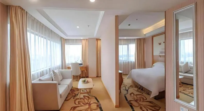 Bed in Vienna Hotel Suzhou Yangcheng Lake Fashion Stage
