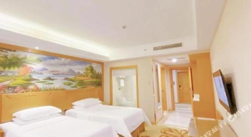 Bed in Vienna Hotel Suzhou Yangcheng Lake Fashion Stage