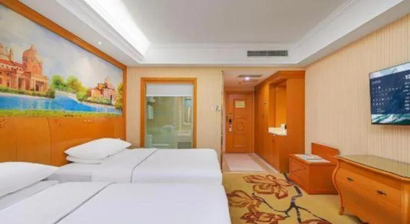 Bed in Vienna Hotel Suzhou Yangcheng Lake Fashion Stage