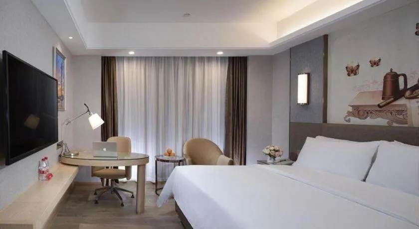 Bed in Vienna Hotel Guangzhou Panyu Square