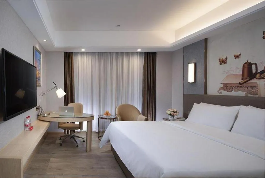 Bed in Vienna Hotel Guangzhou Panyu Square
