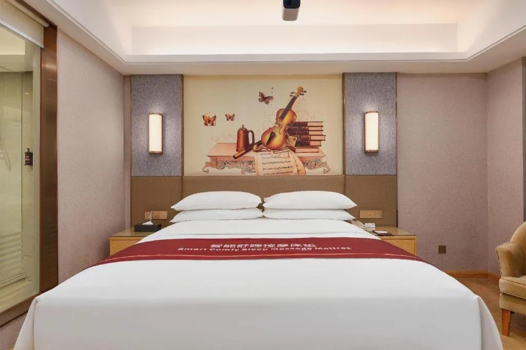 Bed in Vienna Hotel Guangzhou Panyu Square