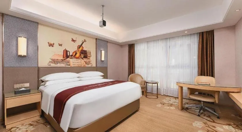 Bed in Vienna Hotel Guangzhou Panyu Square