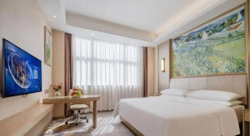 Bed in Vienna Hotel Shenzhen Pingshan Longtian Town