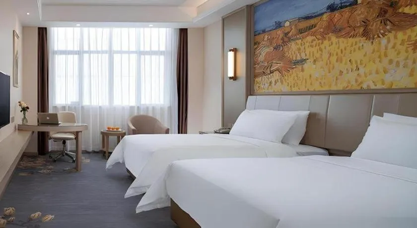 Bed in Vienna Hotel Shenzhen Pingshan Longtian Town