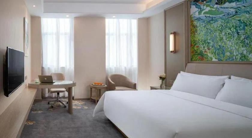 Bed in Vienna Hotel Shenzhen Pingshan Longtian Town