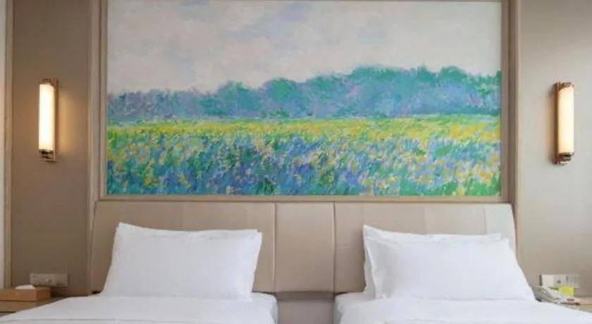 Bed in Vienna Hotel Shenzhen Pingshan Longtian Town