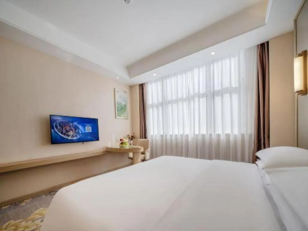 Bed in Vienna Hotel Shenzhen Pingshan Longtian Town