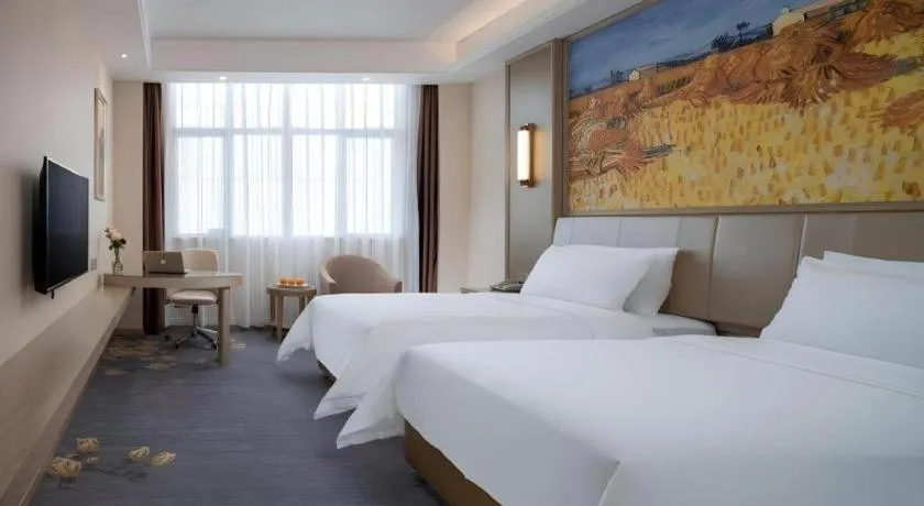 Bed in Vienna Hotel Shenzhen Pingshan Longtian Town