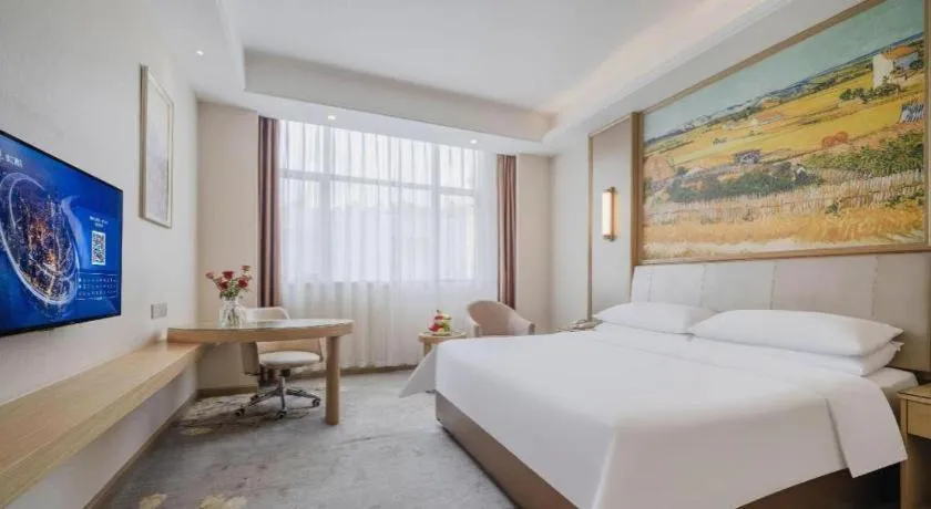 Bed in Vienna Hotel Shenzhen Pingshan Longtian Town