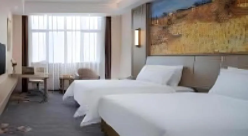 Bed in Vienna Hotel Shenzhen Pingshan Longtian Town