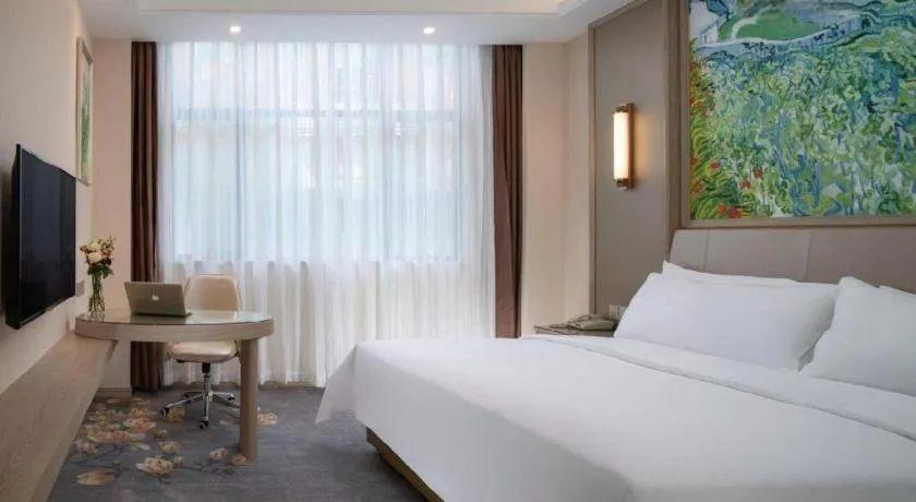 Bed in Vienna Hotel Shenzhen Pingshan Longtian Town