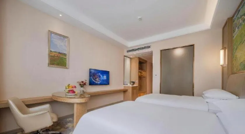 Bed in Vienna Hotel Shenzhen Pingshan Longtian Town