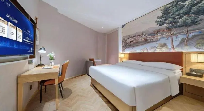 Bed in Vienna Hotel Chongqing Wushan Municipal Government Bed in Vienna Hotel Chongqing Wushan Municipal Government