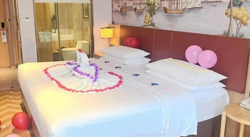 Bed in Vienna Hotel Chongqing Wushan Municipal Government