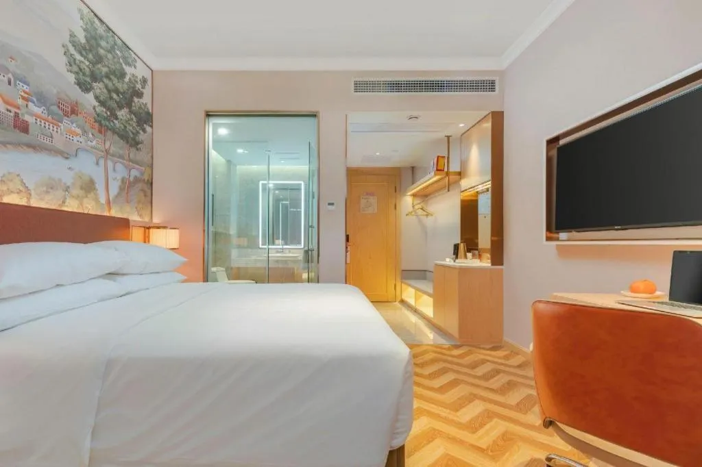 Bed in Vienna Hotel Chongqing Wushan Municipal Government