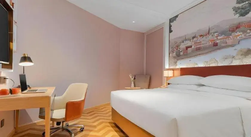 Bed in Vienna Hotel Chongqing Wushan Municipal Government Bed in Vienna Hotel Chongqing Wushan Municipal Government