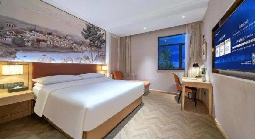 Bed in Vienna Hotel Chongqing Wushan Municipal Government