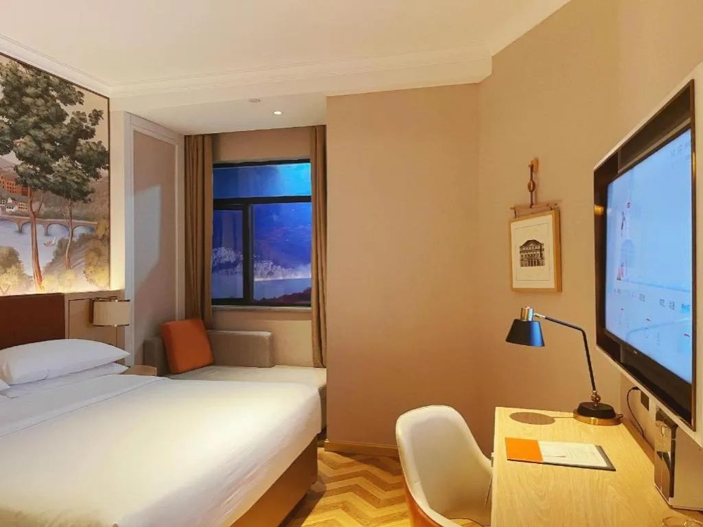 Bed in Vienna Hotel Chongqing Wushan Municipal Government