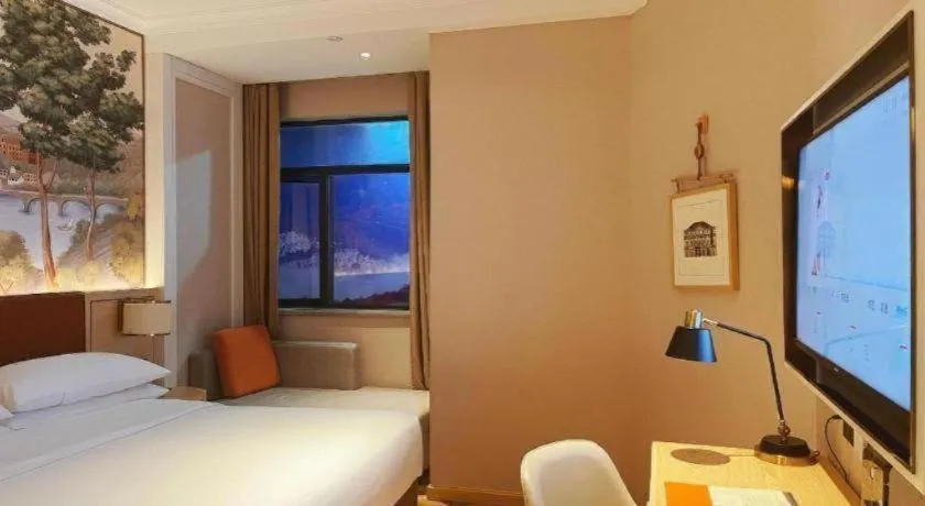 Bed in Vienna Hotel Chongqing Wushan Municipal Government