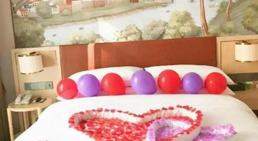 Bed in Vienna Hotel Chongqing Wushan Municipal Government