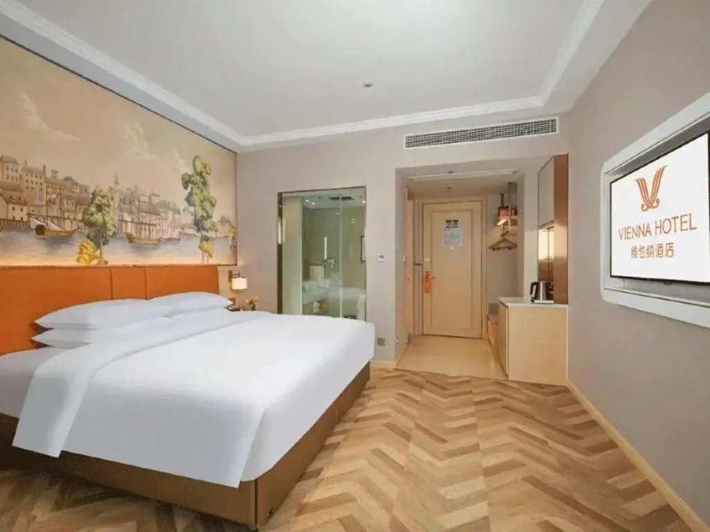Bed in Vienna Hotel Chongqing Wushan Municipal Government