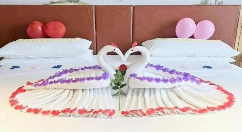 Bed in Vienna Hotel Chongqing Wushan Municipal Government