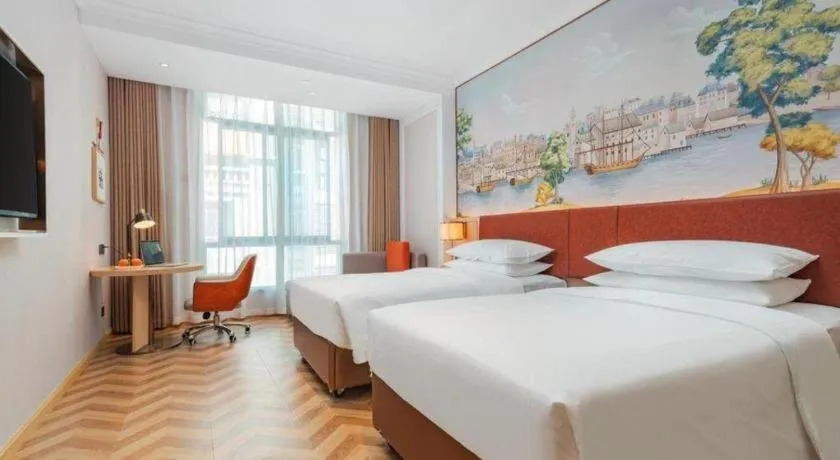 Bed in Vienna Hotel Chongqing Wushan Municipal Government